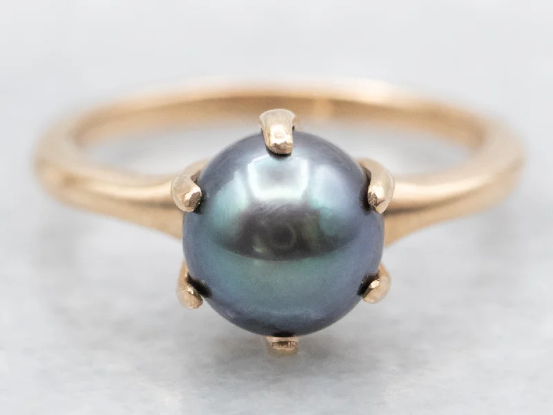 Sapphire Gemstone Rings in a Cathedral SettingMinimalist Purple-Green Pearl Solitaire Ring