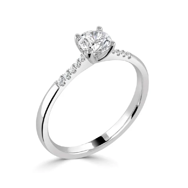 Three - Stone Diamond Rings with Princess - Cut DiamondsThe Primula Platinum Round Brilliant Cut Diamond Solitaire Engagement Ring With Diamond Set Shoulders