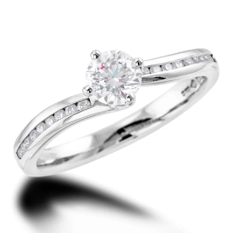 Vintage - Inspired Diamond Rings with Filigree WorkThe Rose Platinum Round Brilliant Cut Diamond Solitaire Engagement Ring With Channel Set Diamond Shoulders