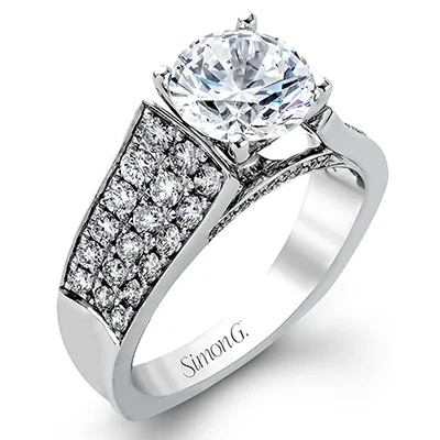 Solitaire Diamond Rings in Platinum SettingsEngagement Ring in 18k Gold with Diamonds