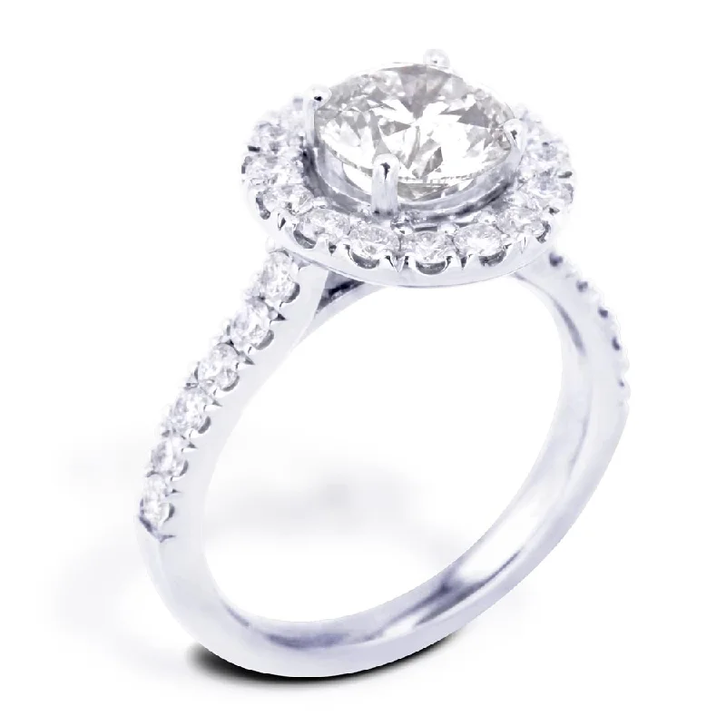 Custom - Designed Diamond Rings to Reflect Your PersonalityThe Rosalia Platinum Round Brilliant Cut Diamond Engagement Ring With Diamond Halo And Diamond Set Shoulders