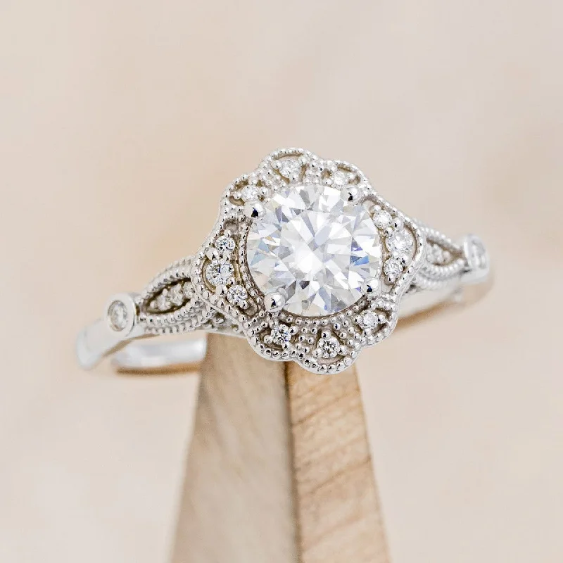 "EILEEN" - ROUND CUT MOISSANITE ENGAGEMENT RING WITH DIAMOND ACCENTS