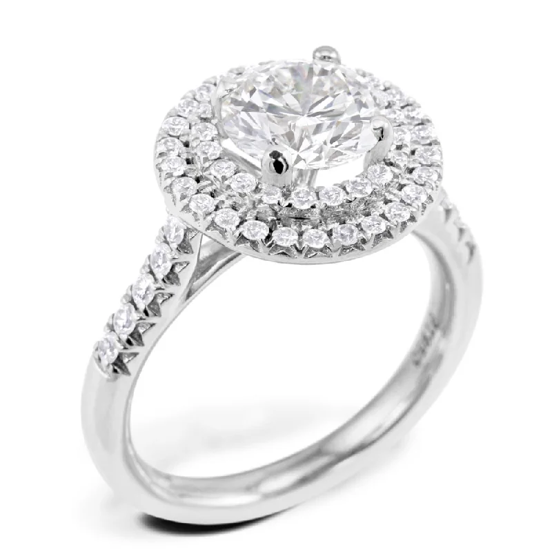 Solitaire Diamond Rings in Platinum SettingsPlatinum 2.04ct Round Brilliant Cut Diamond Engagement Ring With Double Diamond Halo And Diamond Set Shoulders