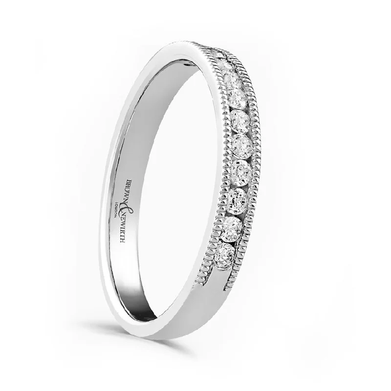 Matching Wedding Bands for a Coordinated LookPlatinum 0.20ct Round Brilliant Cut Diamond Channel Set Half Eternity Ring With Millgrain Detailing