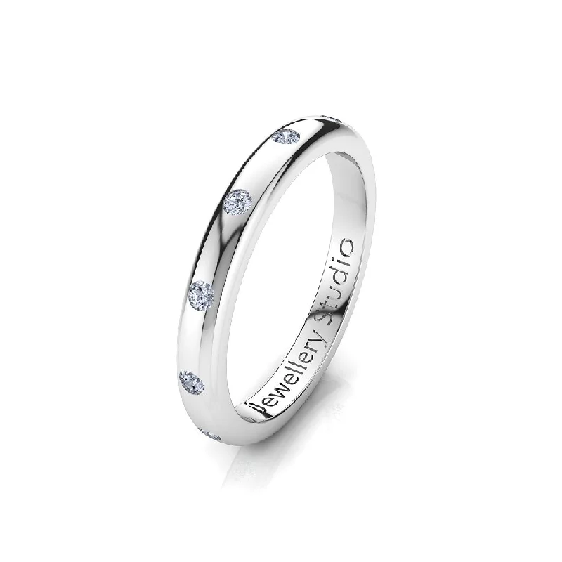 Matching Wedding Bands for a Coordinated LookLadies Eternity Ring with 0.25ct of Hammer Set Diamonds