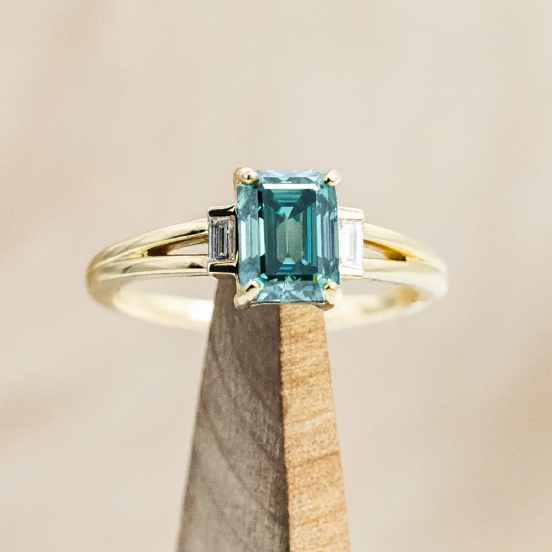 "CORELLA" - EMERALD CUT GREEN MOISSANITE ENGAGEMENT RING WITH DIAMOND ACCENTS