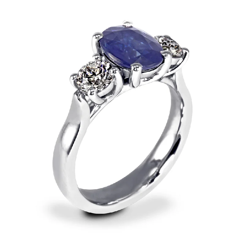 Vintage - Inspired Diamond Rings with Filigree WorkThe Larkspur Platinum 2.14ct Oval Sapphire and 0.80ct Diamond Three Stone Engagement Ring