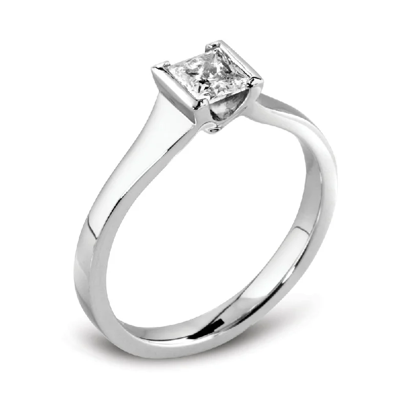 Solitaire Diamond Rings in Platinum SettingsThe Delphine Platinum Princess Cut Diamond Solitaire Engagement Ring