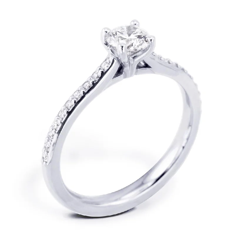 Solitaire Diamond Rings in Platinum SettingsThe Jasmine Platinum Round Brilliant Cut Diamond Solitaire Engagement Ring With Diamond Set Shoulders