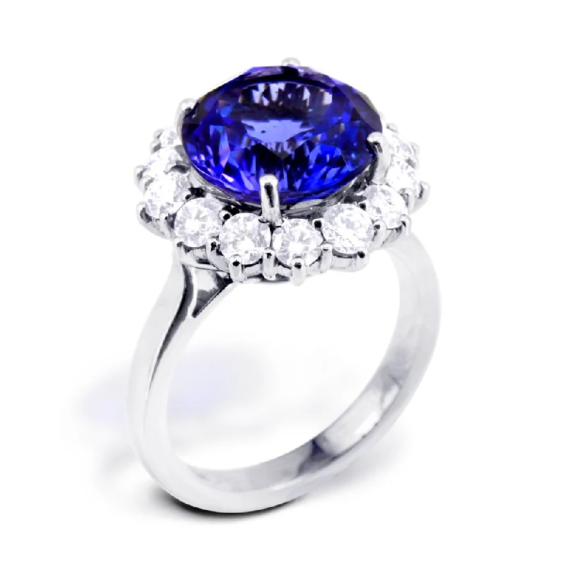 Solitaire Diamond Rings in Platinum Settings18ct White Gold 6.83ct Round Brilliant Cut Tanzanite And 1.51ct Diamond Halo Ring