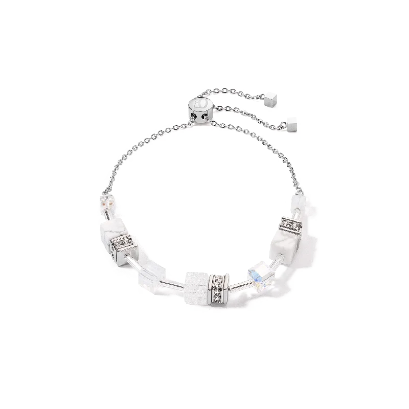 Stackable Bangle Sets for a Trendy LookCoeur De Lion GeoCUBE® Iconic Nature White and Silver Chain Bracelet