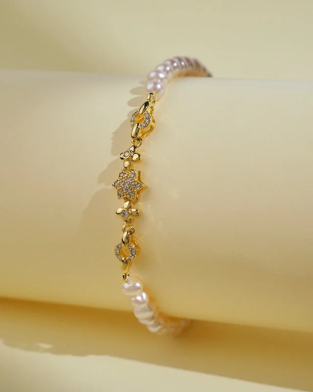 Solid Gold Bangles with Intricate EngravingsFlory White 1 lLine Pearl Bracelet