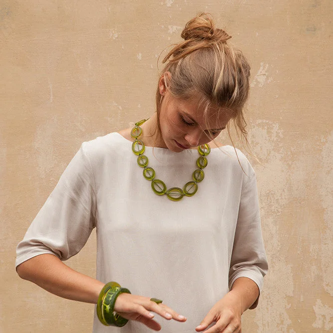 Solid Gold Bangles with Intricate EngravingsSakura Short Resin Necklace