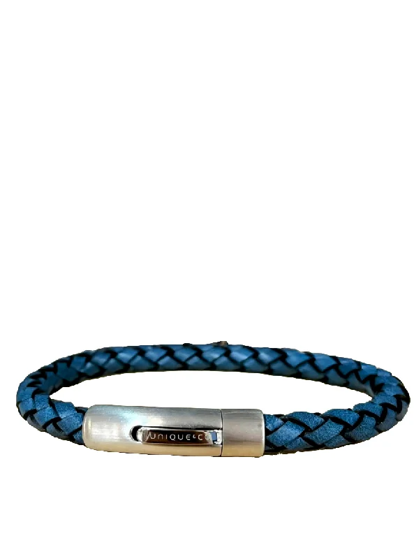 Solid Gold Bangles with Intricate EngravingsUnique and Co Water Blue Leather Bracelet