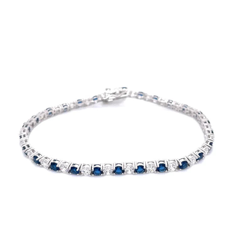 Solid Gold Bangles with Intricate EngravingsSterling Silver Sapphire & White CZ Tennis Bracelet