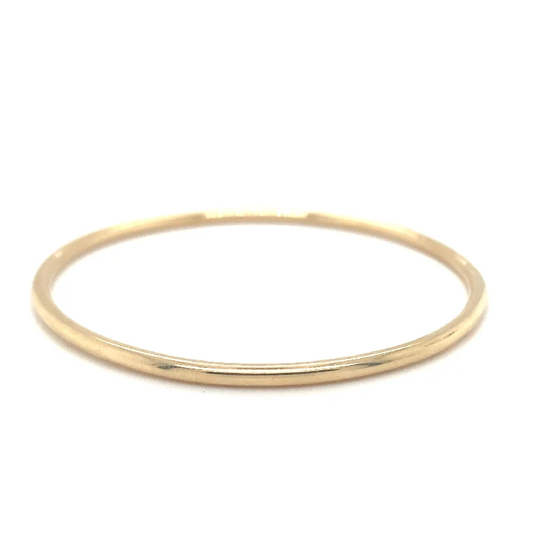 Stackable Bangle Sets for a Trendy LookTadgh Óg 9ct Yellow Gold Round Wire Bangle