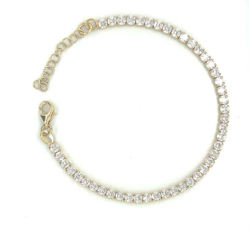 Stackable Bangle Sets for a Trendy LookGolden Tennis Bracelet